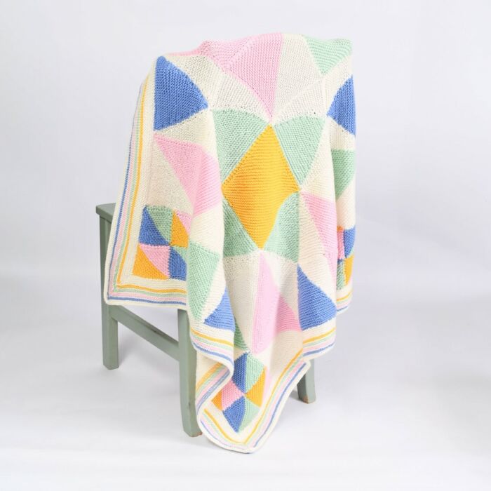 Geometric Blanket Knitting Pattern by Nicola Valiji in WoolBox Imagine Classic & Lullaby DK  