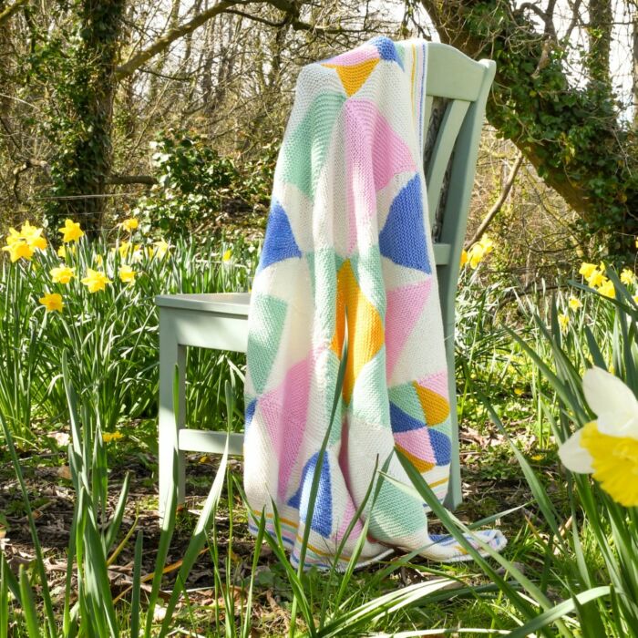 Geometric Blanket Knitting Pattern by Nicola Valiji in WoolBox Imagine Classic & Lullaby DK  