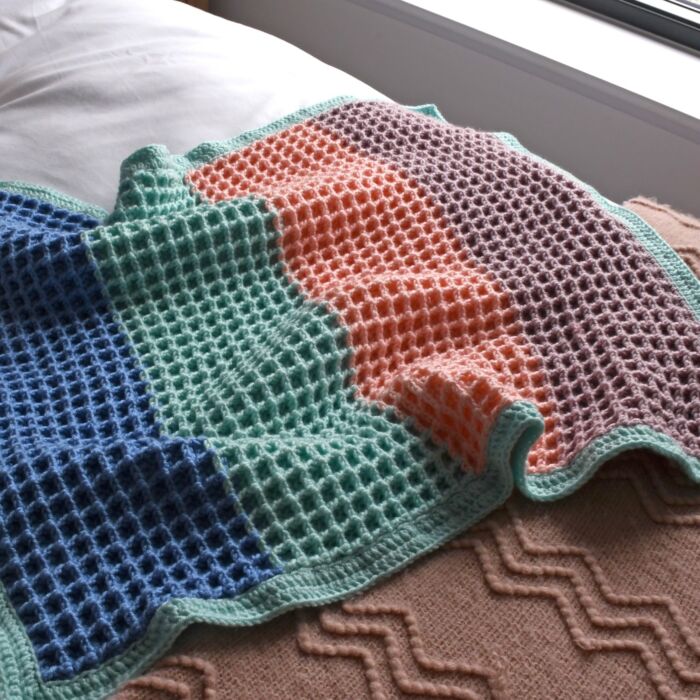 Waffle Baby Blanket Crochet Pattern in WoolBox Imagine Lullaby Anti-Pilling DK by Zoe Potrac